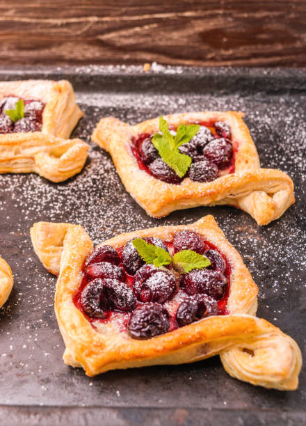 istock Homemade puff pastry with cherry 975647582