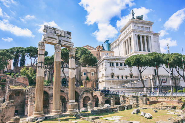 istock Roman Forum in Rome, Italy on blue sky background 975648962