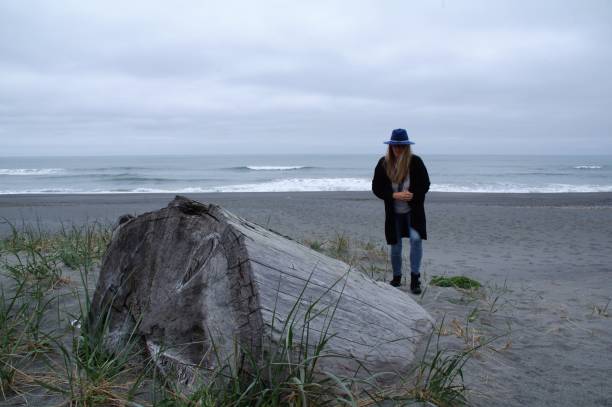 istock Woman watching the ocean 975652058