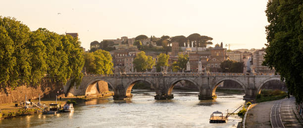 istock Bridge over Tiber river. Rome, Italy 975652538