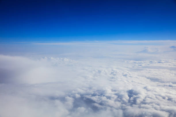 istock Beautiful view of clouds and sky from a plane window 975656534