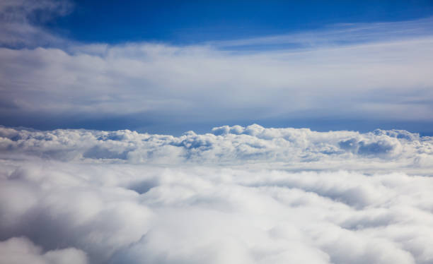 istock Beautiful view of clouds and sky from a plane window 975656934