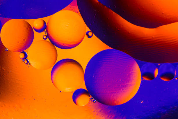 istock Scientific image of cell membrane. Macro up of liquid substances. Abstract molecule atom sctructure. Water bubbles. Macro shot of air or molecule. Biology, phycics or chymistry abstract background. 975658292