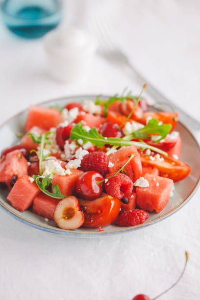 Summer salad with fruits and vegetables