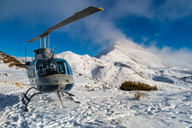 istock Helicopter in the alps 975678216
