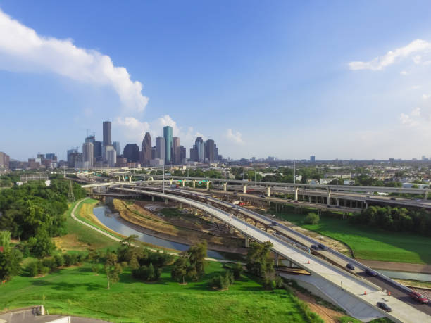 istock Downtown and interstate I45 highway flyover aerial 975682238