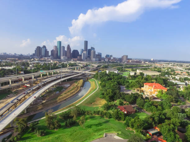 istock Downtown and interstate I45 highway flyover aerial 975684462