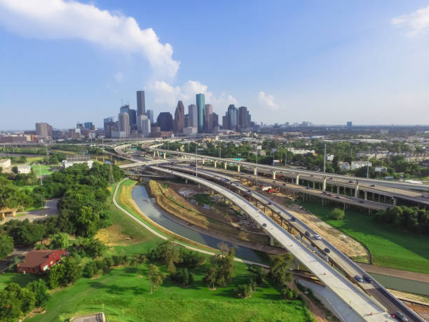 istock Downtown and interstate I45 highway flyover aerial 975684502