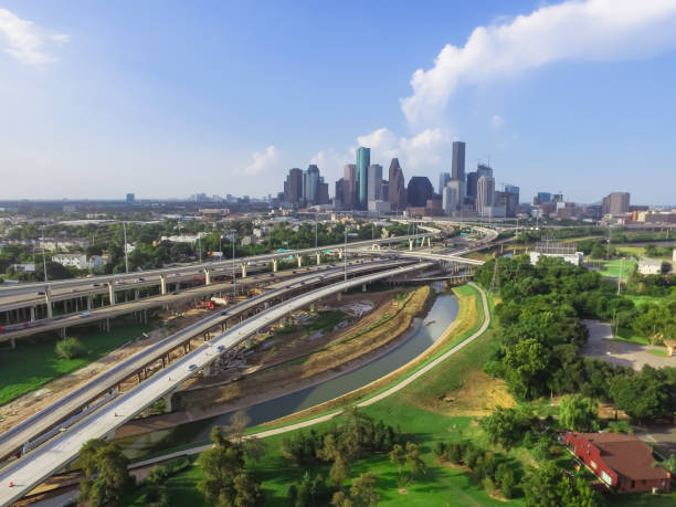 istock Downtown and interstate I45 highway flyover aerial 975684544