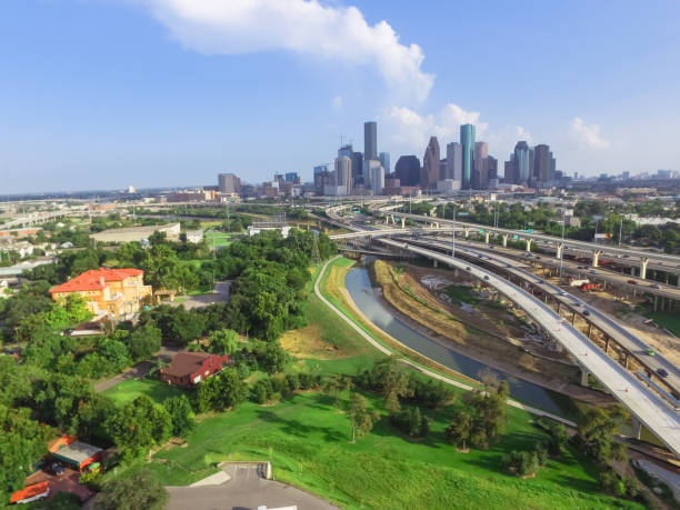 istock Downtown and interstate I45 highway flyover aerial 975684628