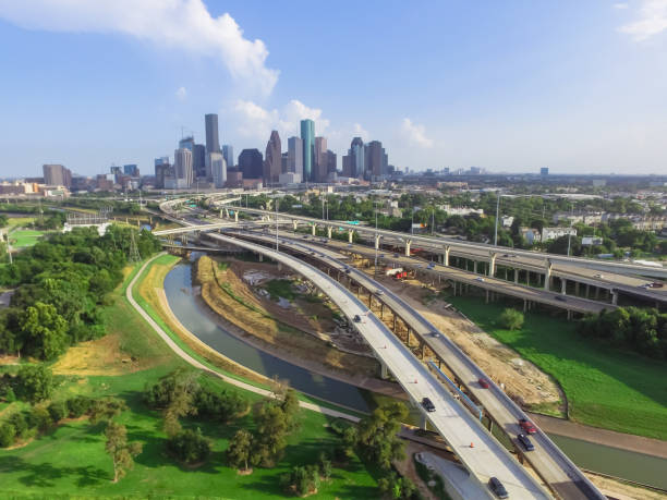 istock Downtown and interstate I45 highway flyover aerial 975684682
