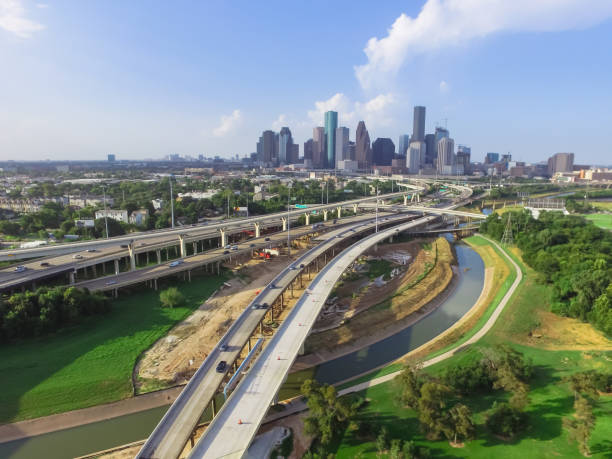 istock Downtown and interstate I45 highway flyover aerial 975684740
