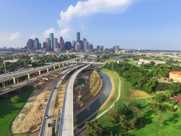 istock Downtown and interstate I45 highway flyover aerial 975684912