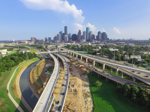istock Downtown and interstate I45 highway flyover aerial 975684958