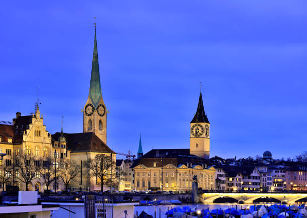Old town and St. Peter's church at night, Zurich, Switzerland.