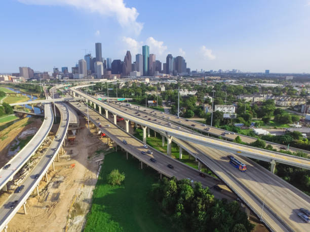 istock Downtown and interstate I45 highway flyover aerial 975685212