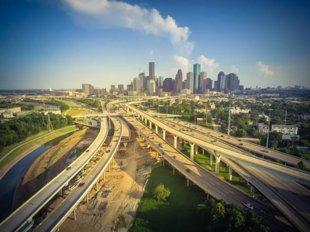 istock Vintage tone downtown and interstate I45 highway flyover 975685392