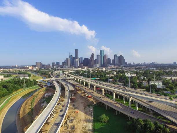 istock Downtown and interstate I45 highway flyover aerial 975685598