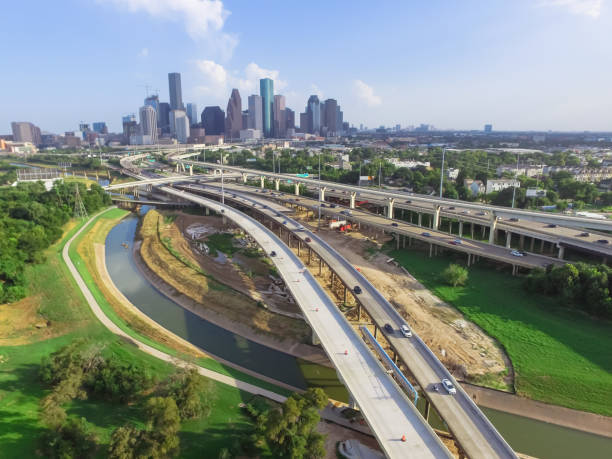 istock Downtown and interstate I45 highway flyover aerial 975685658