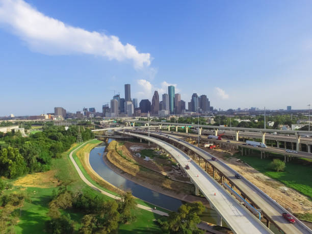 istock Downtown and interstate I45 highway flyover aerial 975685808