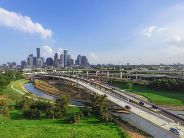 istock Downtown and interstate I45 highway flyover aerial 975687904