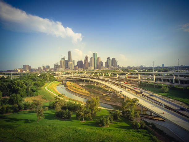 istock Vintage tone downtown and interstate I45 highway flyover 975688004
