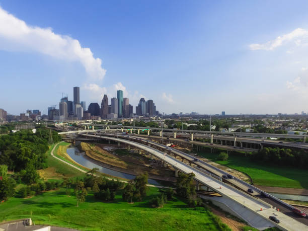 istock Downtown and interstate I45 highway flyover aerial 975688168
