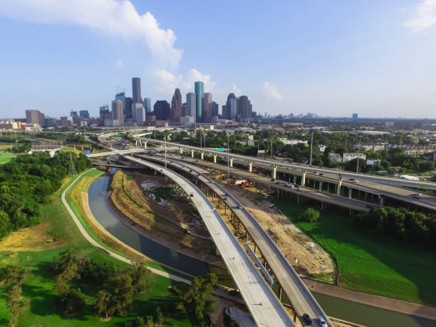istock Downtown and interstate I45 highway flyover aerial 975688260