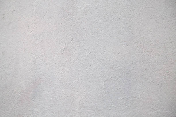 istock Texture of white painted concrete wall 975691752