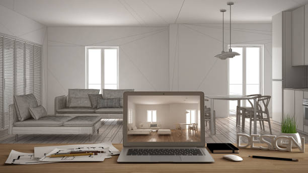 istock Architect designer desktop concept, laptop on wooden work desk with screen showing interior design project, blurred draft in the background, contemporary living room idea template 975701304