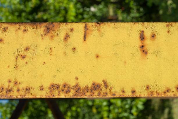 istock Abstract corroded rusty metal background, texture, yellow brown. 975701530