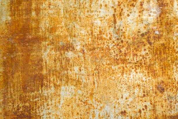 istock Abstract corroded rusty metal background, texture, yellow brown. 975701600