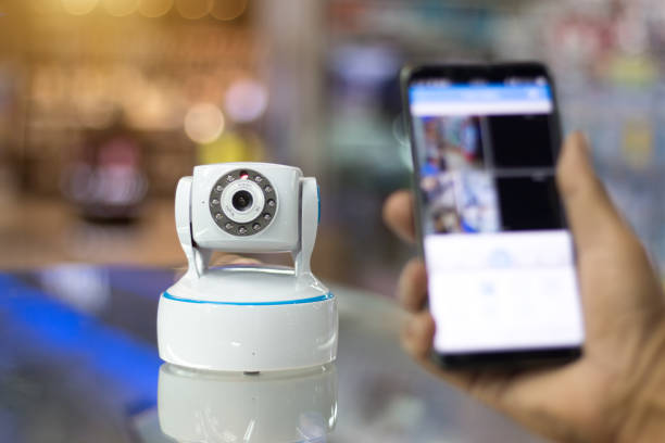 istock Male hand press phone watch CCTV 975704588