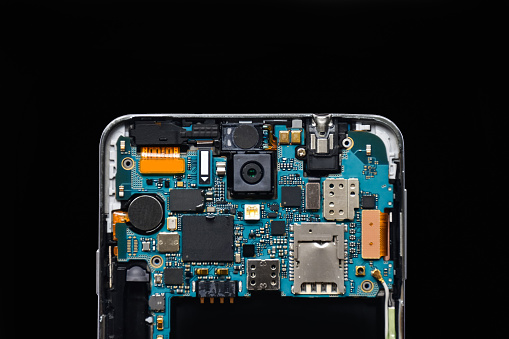 Isolate disassembled smartphone (mobile phone) on black background. Mobile concept (technology)