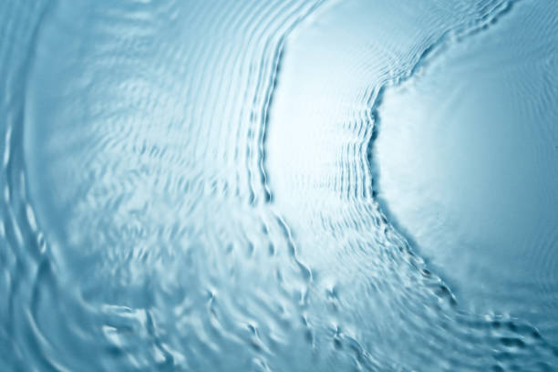 istock Blue clear water with many waves 975708150