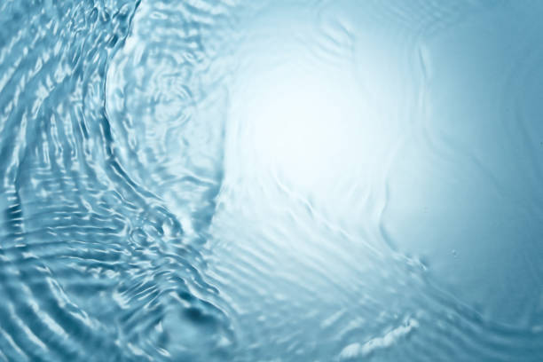 istock Blue clear water with many waves 975711858