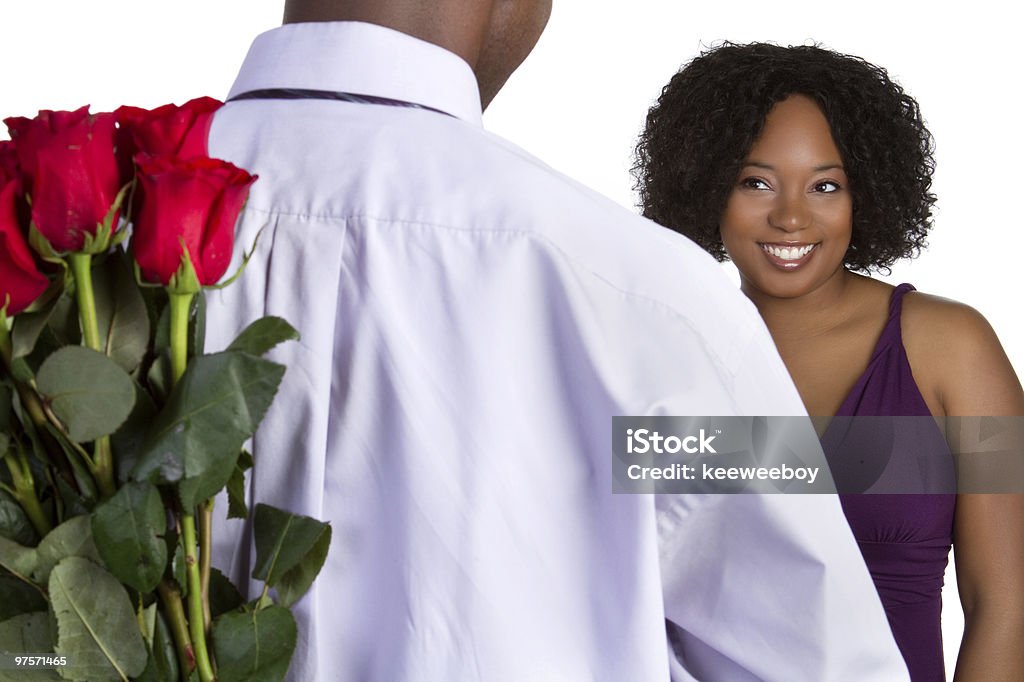 Hombre dando flores - Foto de stock de Adulto libre de derechos