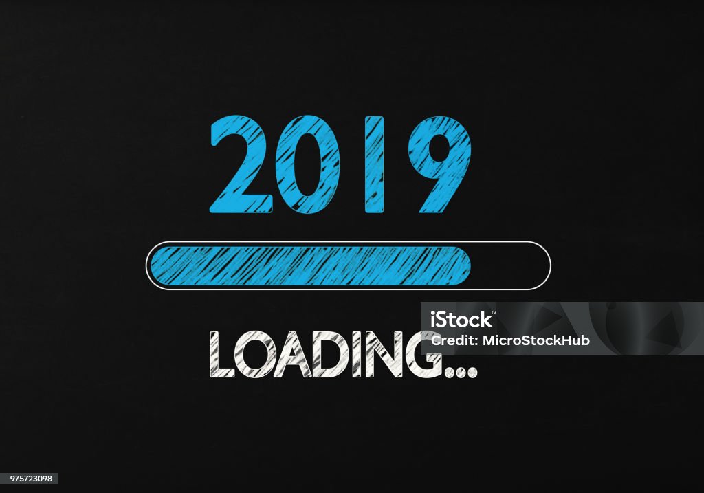 Chalk Drawing: New Year 2019 Loading On Blackboard Chalk Drawing: New year 2019 loading on Blackboard. 2019 loading writes on blackboard with a chalk effect. Horizontal composition with copy space. 2019 Stock Photo