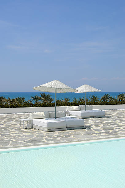 istock Beach beds near swimming pool, Antalya, Turkey 97572429