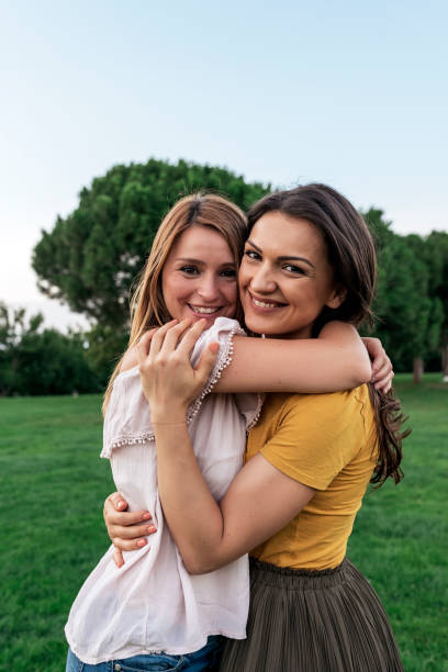istock Beautiful women smiling and having fun. 975725628
