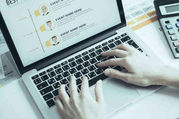 istock Female accountant working on laptop at table 975736612
