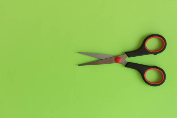 istock Scissors top view on modern pastel color background. 975736728