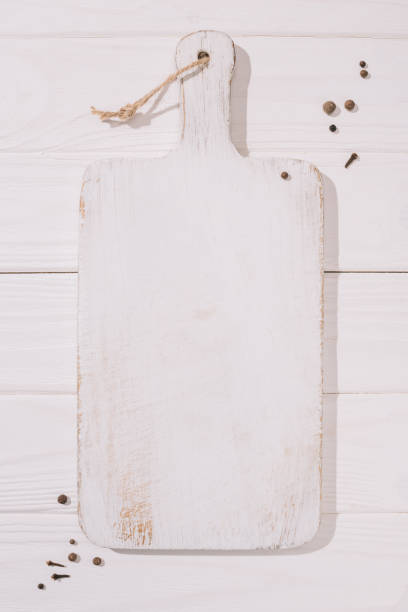 istock top view of white wooden cutting board 975737610