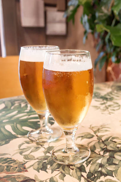 istock Two glasses of beer on the table in bar 975738382