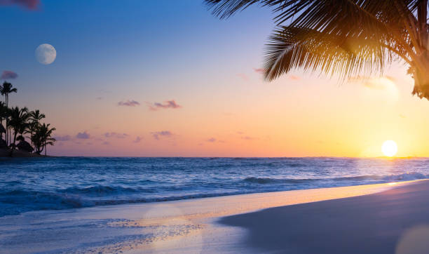 istock Art summer vacation drims; Beautiful sunset over the tropical beach 975748324