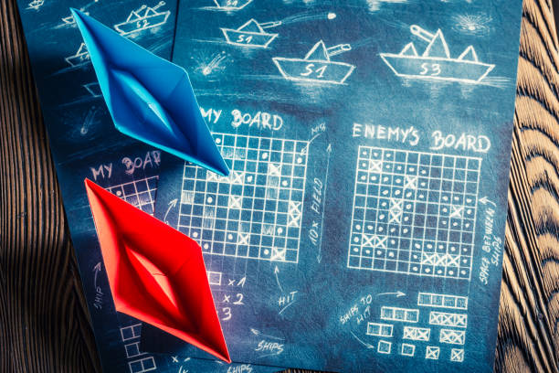 istock Top view of battleship paper game as a battle concept 975750020