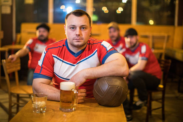 istock Mature man watching sport game 975762556
