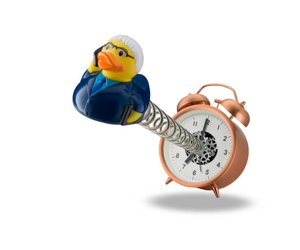 istock springing out of alarm clock 975763186