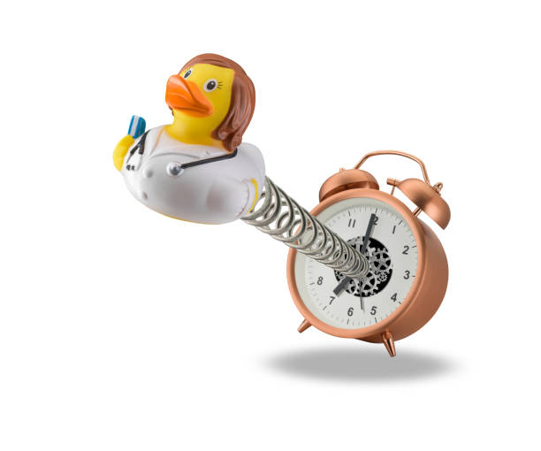 Photo of Female rubber duck doctor springing out of alarm clock