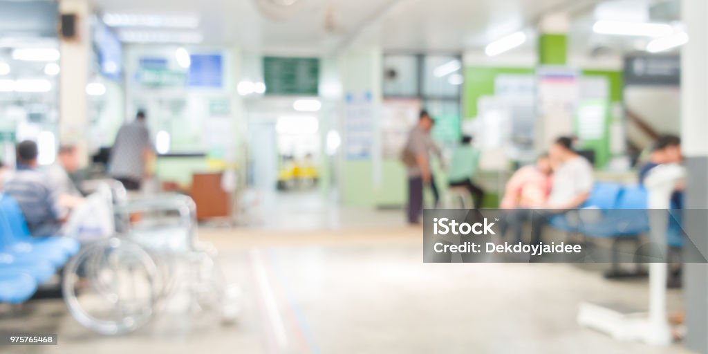 Blurry wheelchair with Individuals use the hospital service.Wait patient history, talking to doctor Hospital Stock Photo